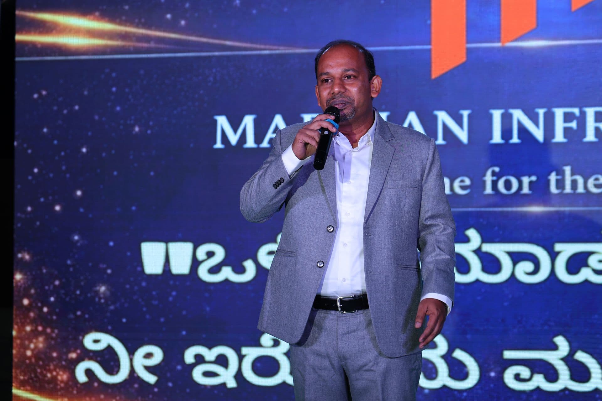 John Benedict speaking at an event