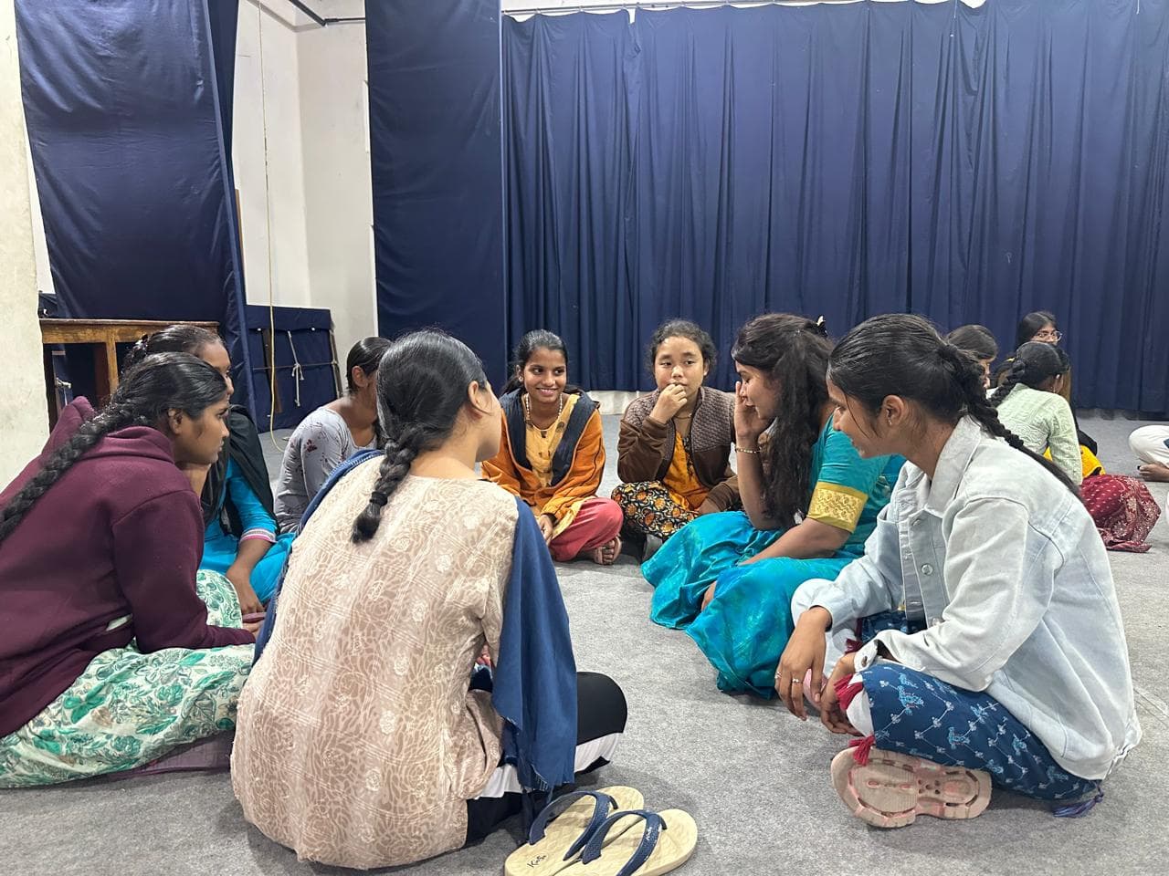 Young women in a community support circle session